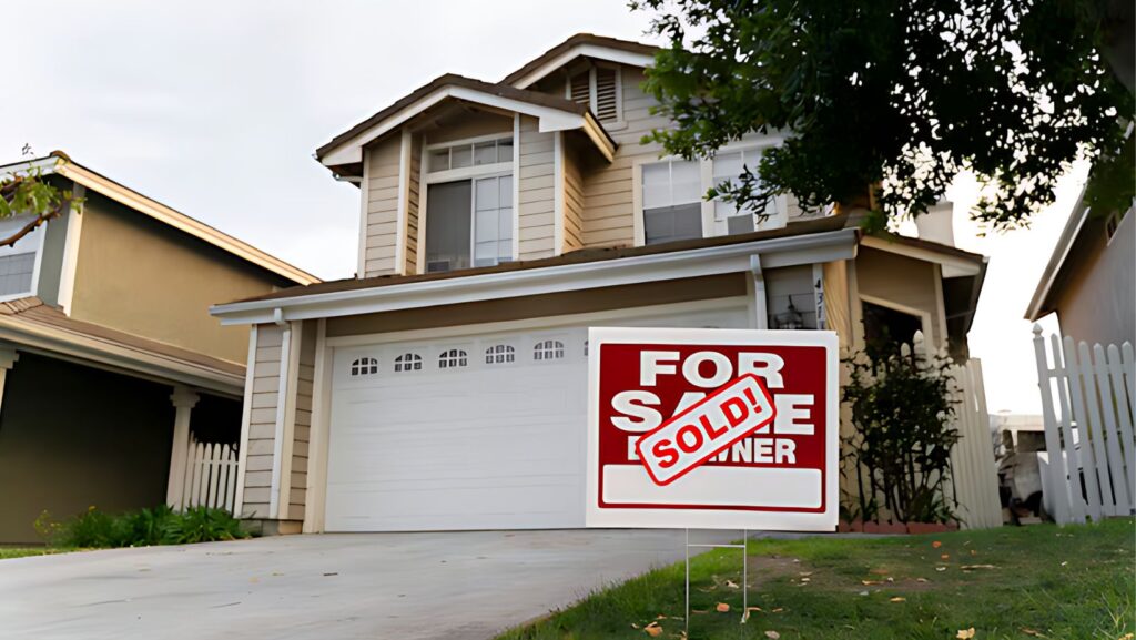 House with a sold sign in front, facilitated by Australian buyer's agent